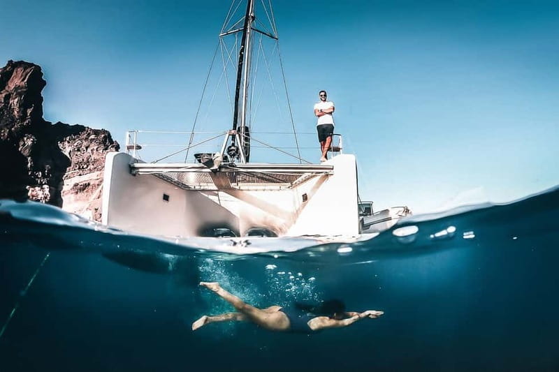 Santorini: All-Inclusive Private Catamaran Experience - Red Beach and White Beach from sea level