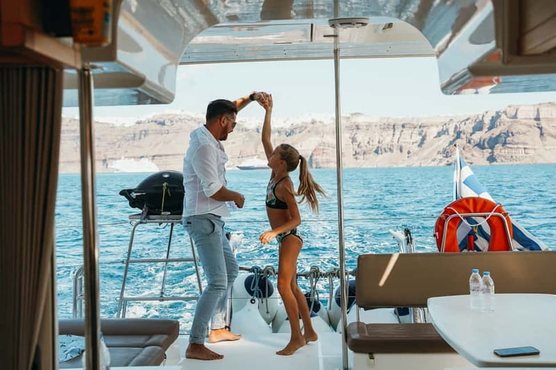 Santorini: All-Inclusive Private Catamaran Experience - Swimming at Palea Kameni’s hot springs