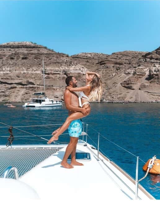 Santorini: All-Inclusive Private Catamaran Experience - Choosing day cruise or sunset cruise
