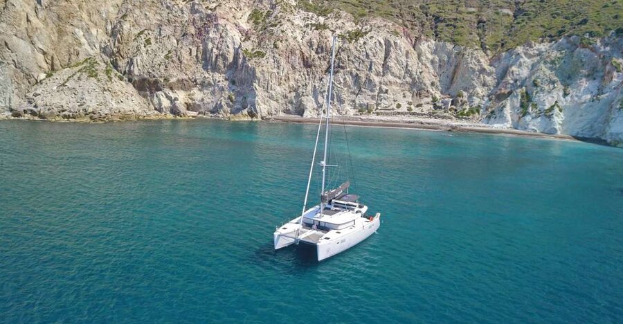 Santorini: Caldera Luxury Catamaran Cruise w/ Meal & Drinks - Sailing past Akrotiri Lighthouse