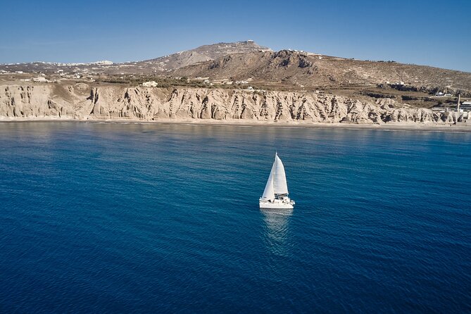 Santorini: Caldera Private Catamaran Cruise with Meal & Drinks - A private way to see Santorini’s caldera