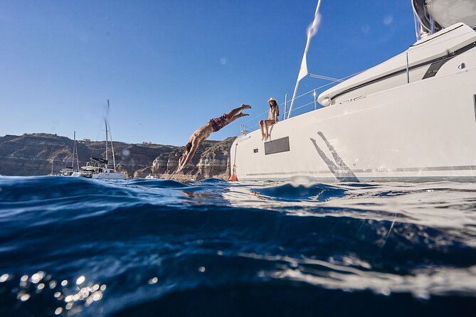 Santorini: Caldera Private Catamaran Cruise with Meal & Drinks - Nea Kameni brings the longest stop