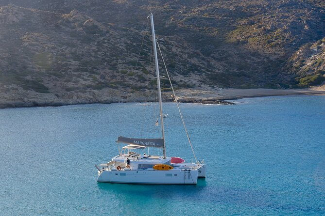 Santorini: Caldera Private Catamaran Cruise with Meal & Drinks - White Beach, reached only from the sea