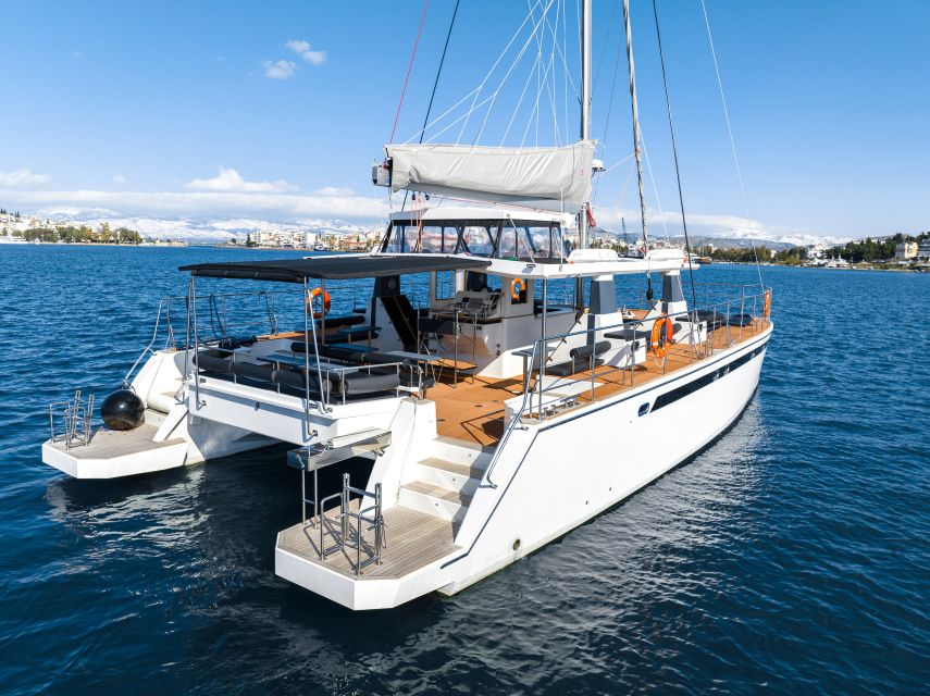 Santorini: Catamaran Caldera Cruise with Meal and Drinks - Red Beach and the volcanic coast