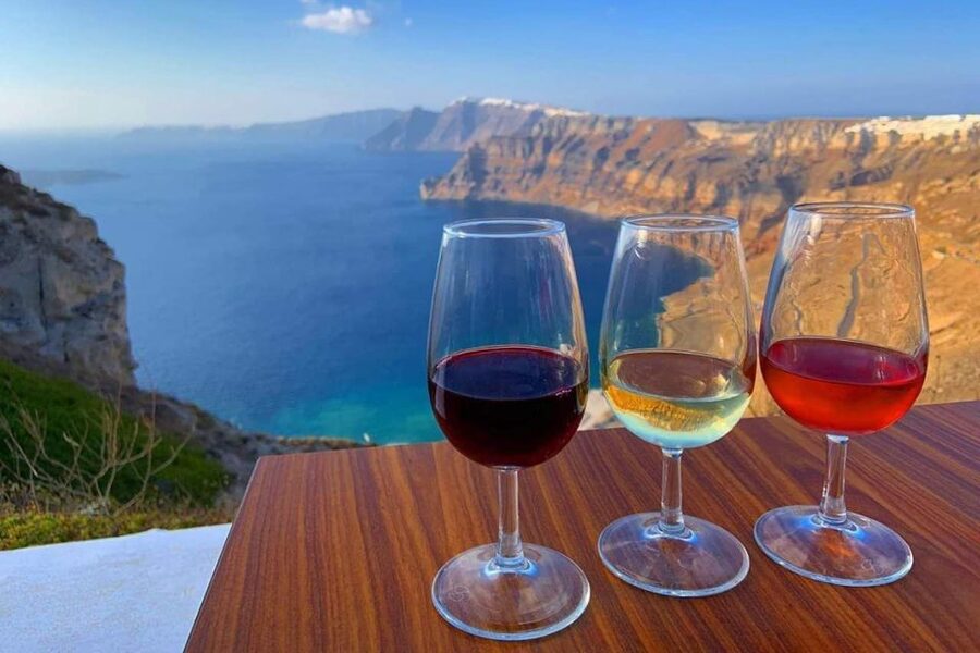 Santorini: Catamaran Cruise, Winery, & Oia Sunset Combo Tour - Mesa Gonia and Santorini’s wine tradition