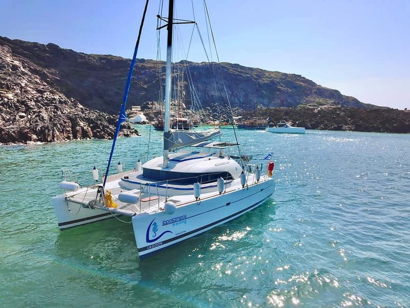 Santorini: Catamaran Cruise with Food and Drinks - Lighthouse and Indian Rocks bring the quiet sailing
