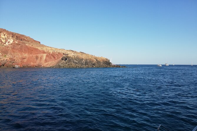 Santorini Catamaran Cruise with Fresh Meal and Open Bar - From Vlychada port to Red Beach