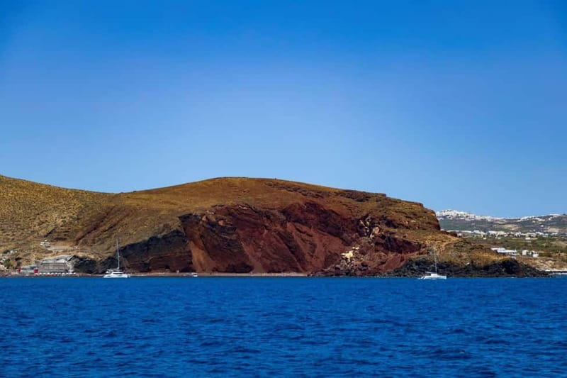 Santorini: Catamaran Cruise with Fresh Meal & Open Bar - Leaving Vlychada and following Santorini’s colored coast