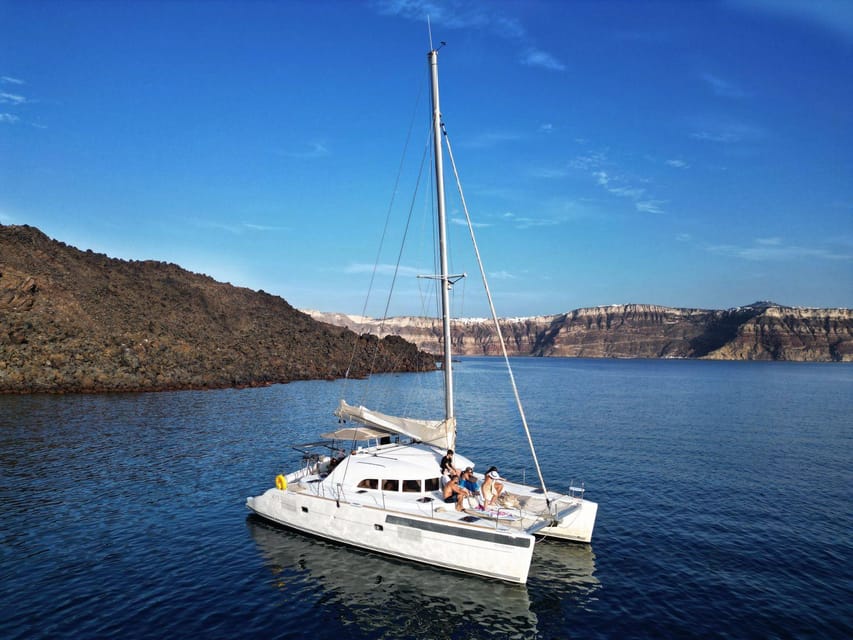 Santorini: Catamaran Cruise with Greek BBQ and Drinks - Setting Out From Vlychada Marina