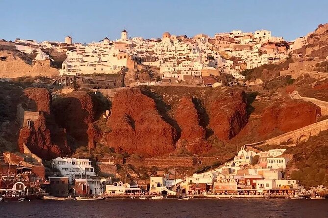 Santorini Catamaran Cruise with Greek Meal, Open-Bar and Sunset - The Luxury Route Beneath Oia