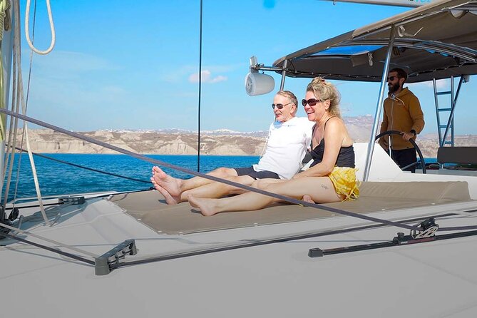 Santorini Catamaran Cruise with Greek Meal, Open-Bar and Sunset - Lunch on a Moving Greek Kitchen