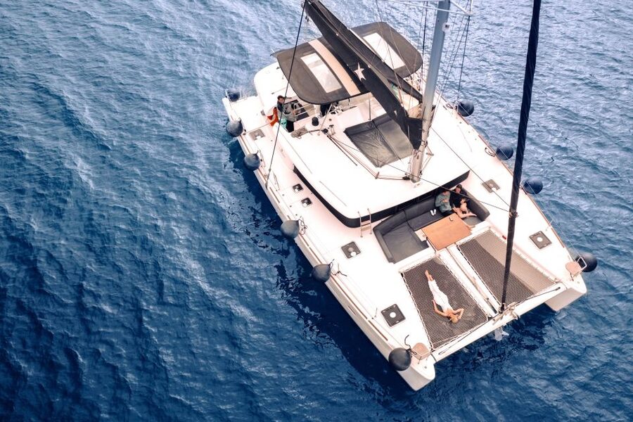 Santorini: Catamaran Cruise with Lunch, Drinks, & Oia Visit - Thirassia brings the first long swim