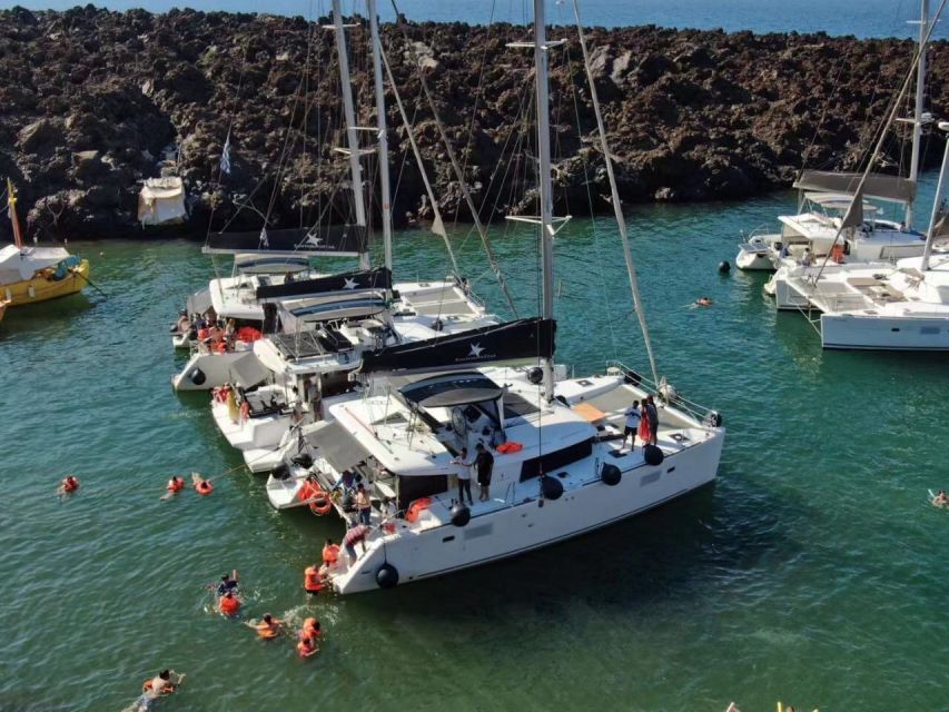 Santorini: Catamaran Cruise with Meal & Open Bar - Mesa Pigadia and the first proper swim