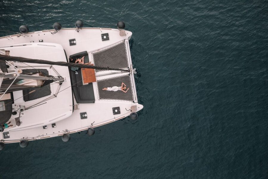 Santorini Catamaran Cruise with Swimming, Meal and Open Bar - The Akrotiri Lighthouse and the Caldera coast