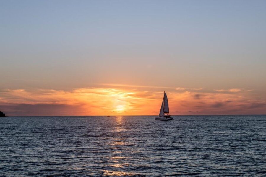 Santorini Catamaran Sunset Skyline Cruise - White Beach and Mesa Pigadia bring more time in the water