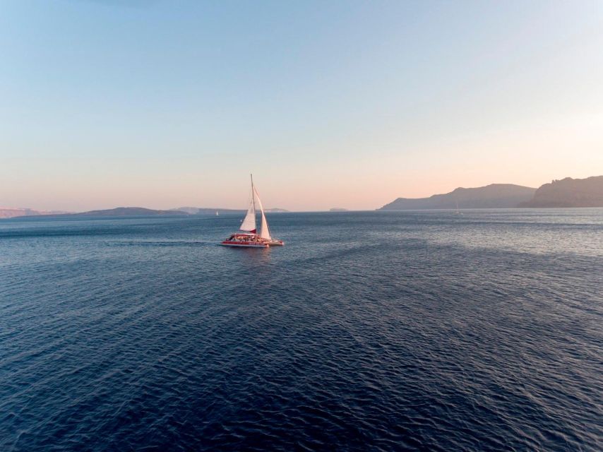 Santorini: Cruise Catamaran with BBQ & Drinks Day or Sunset - Nea Kameni and the volcanic heart of the caldera