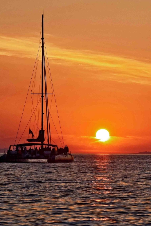 Santorini: Cruise Catamaran with BBQ & Drinks Day or Sunset - Aspronisi, Akrotiri, and the old lighthouse