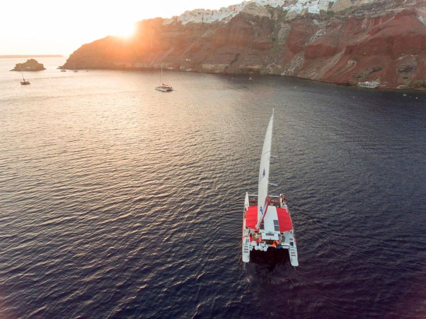 Santorini: Cruise Catamaran with BBQ & Drinks Day or Sunset - Fira’s caldera views and the old port
