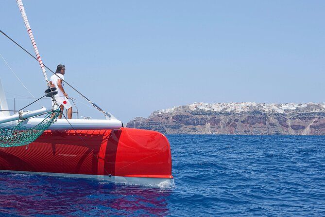 Santorini Cruise on Catamaran with BBQ & Open Bar - Red Beach for photos and snorkeling