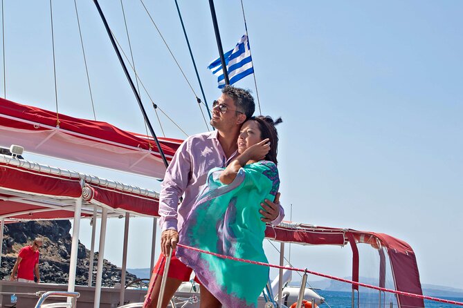 Santorini Cruise on Catamaran with BBQ & Open Bar - White Beach, lunch, and the longest stop