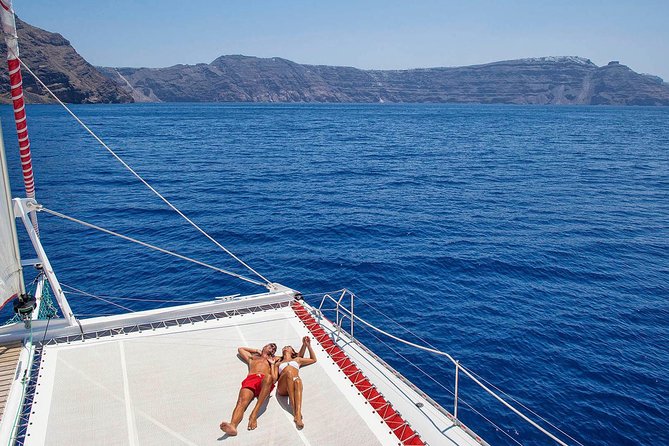 Santorini Cruise on Catamaran with BBQ & Open Bar - First swim near the volcano and hot springs