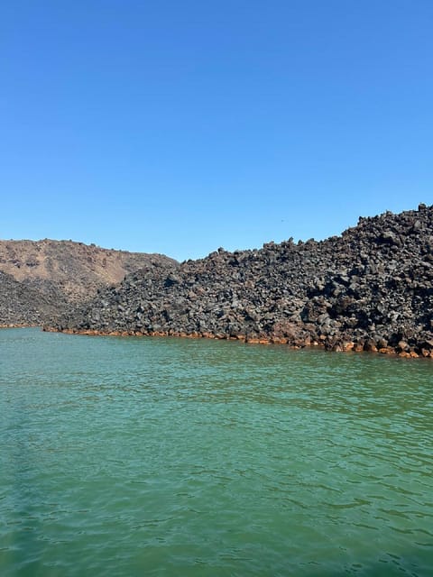 Santorini:Cruises with Catamaran around the Volcanic Island. - Black Mountain and underwater caves