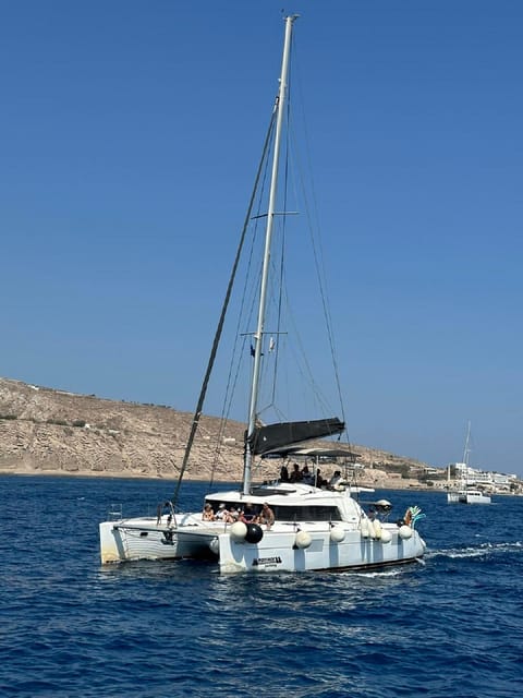 Santorini:Cruises with Catamaran around the Volcanic Island. - Crew service and the feel onboard
