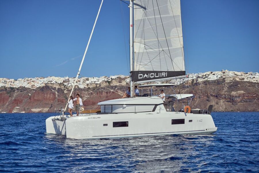 Santorini: Day Luxury Catamaran Cruise with Meal & Drinks - Thirassia gives you the first real swim