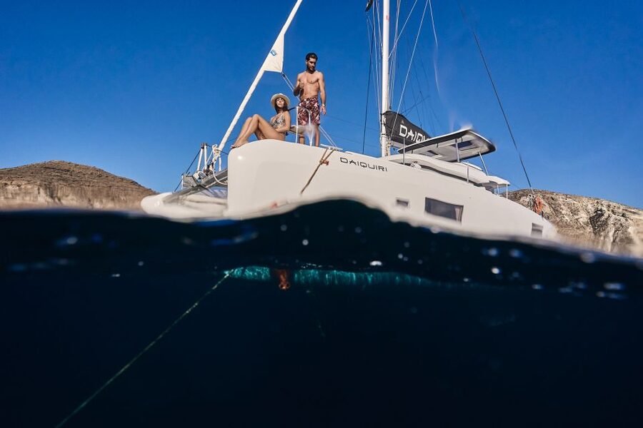Santorini: Day Luxury Catamaran Cruise with Meal & Drinks - The volcanic islets bring the geology lesson