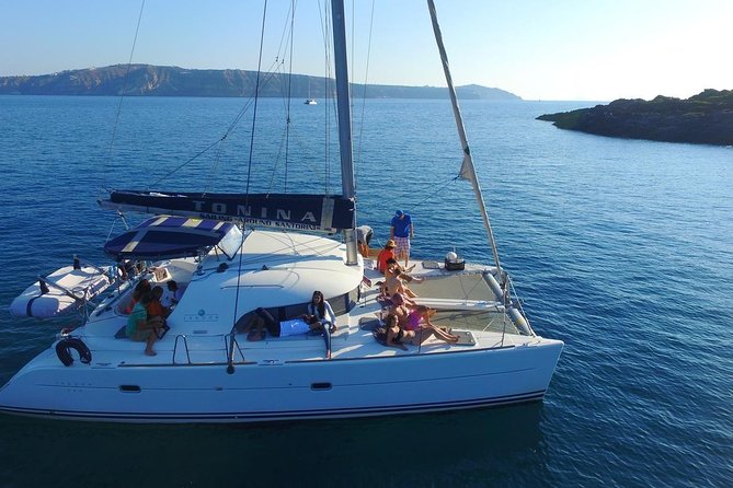Santorini Full Day Catamaran Private Cruise incl. Meal, Drinks & Free Transport - What the $805.02 price really means