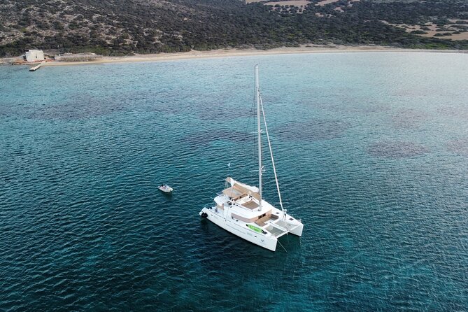 Santorini Gold Catamaran Cruise with BBQ, Drinks and Hotel Pickup - Volcano hot springs: unusual water, realistic expectations