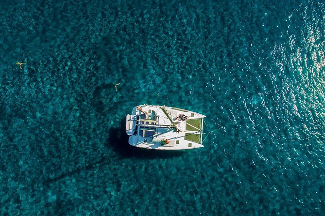 Santorini Half Day Catamaran Private Cruise incl. Meal, Drinks & Free Transport - Why a private boat changes the Santorini day