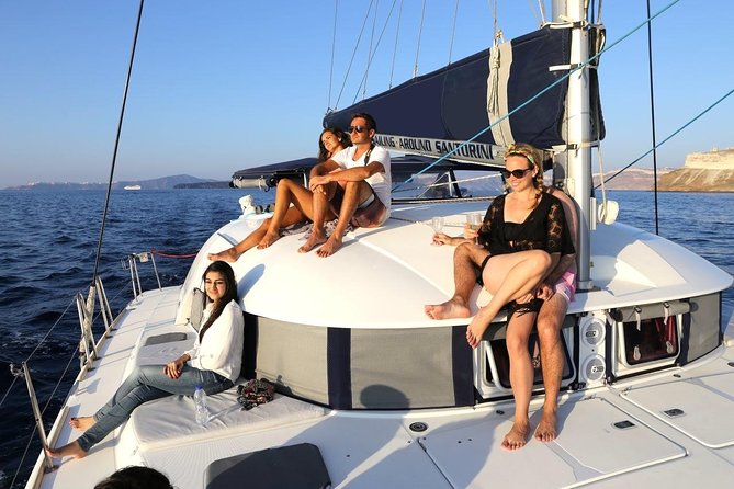 Santorini Half Day Catamaran Private Cruise incl. Meal, Drinks & Free Transport - Red Beach and White Beach: Santorini’s most dramatic coves