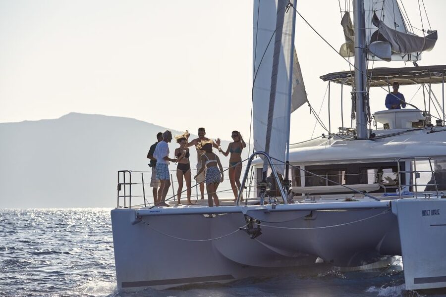 Santorini: Luxurious Catamaran Cruise with Meal & Open Bar - Transfers, boarding, and mobility concerns