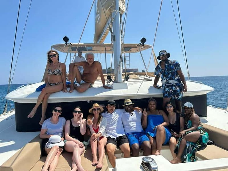 Santorini: Luxury Catamaran Cruise with Lunch, BBQ & Drinks - Weather, clothing, and practical limits