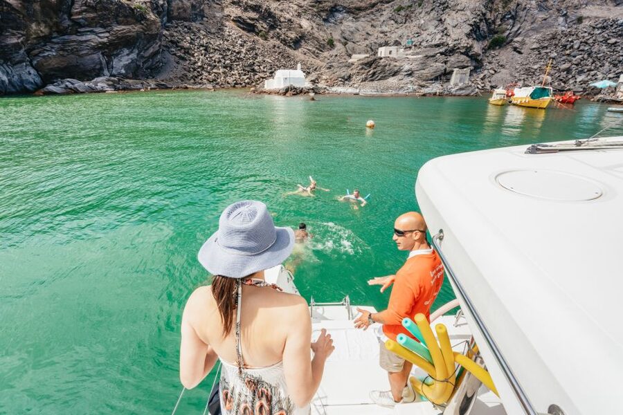 Santorini: Luxury Catamaran Day Trip with Meal and Open Bar - Red Beach and the first swim