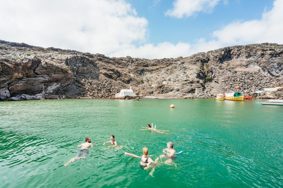 Santorini: Luxury Catamaran Day Trip with Meal and Open Bar - White Beach sea caves and snorkeling