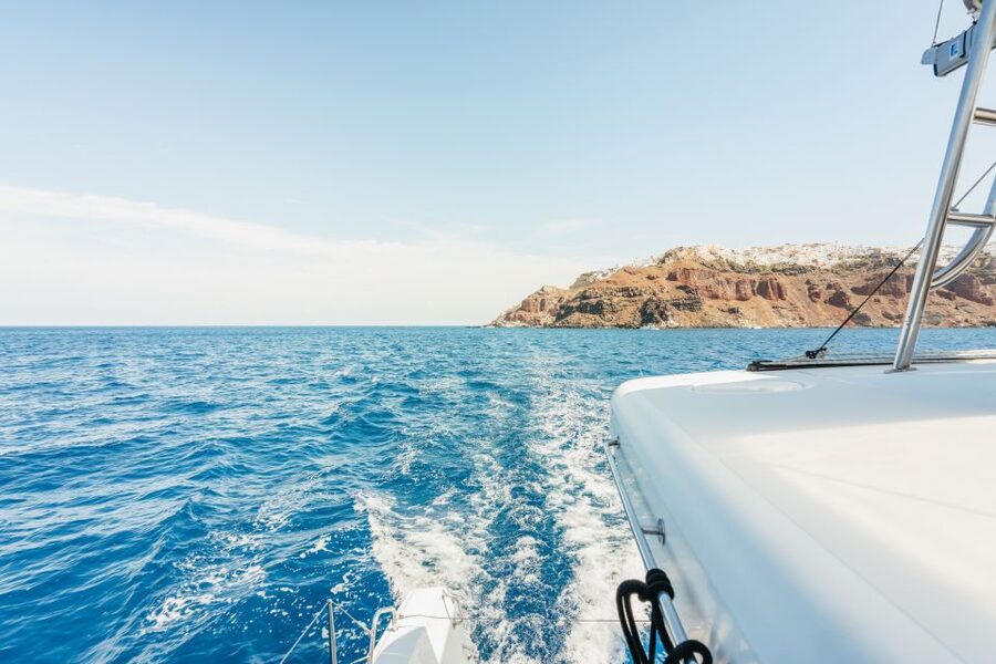 Santorini: Luxury Catamaran Day Trip with Meal and Open Bar - Caldera views from Fira to Oia