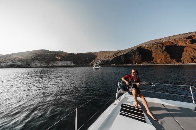Santorini Luxury Catamaran Private Cruise - Black Mountain, the lighthouse, and Indian Rock