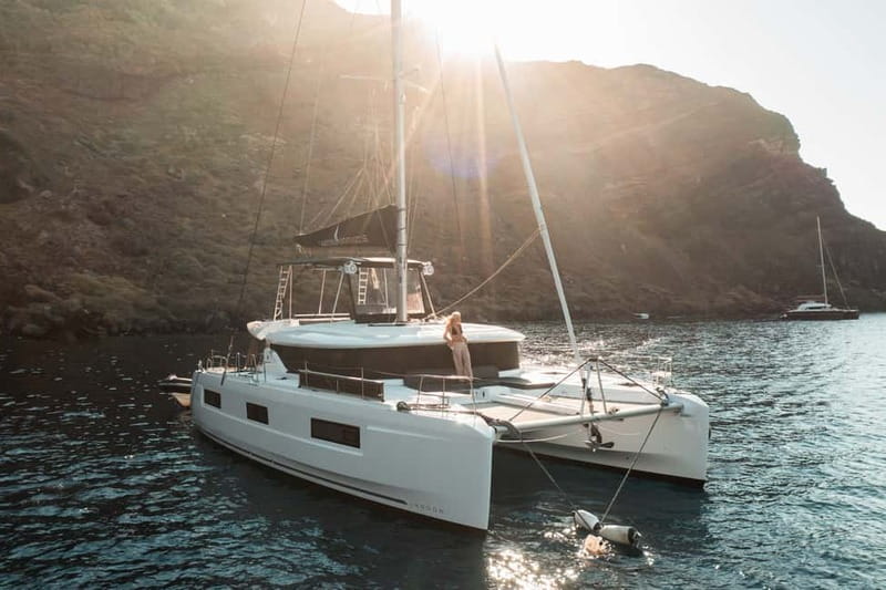 Santorini: Majestic Catamaran Cruise with Meal and Drinks - Red Beach and White Beach: Santorini’s colorful coast