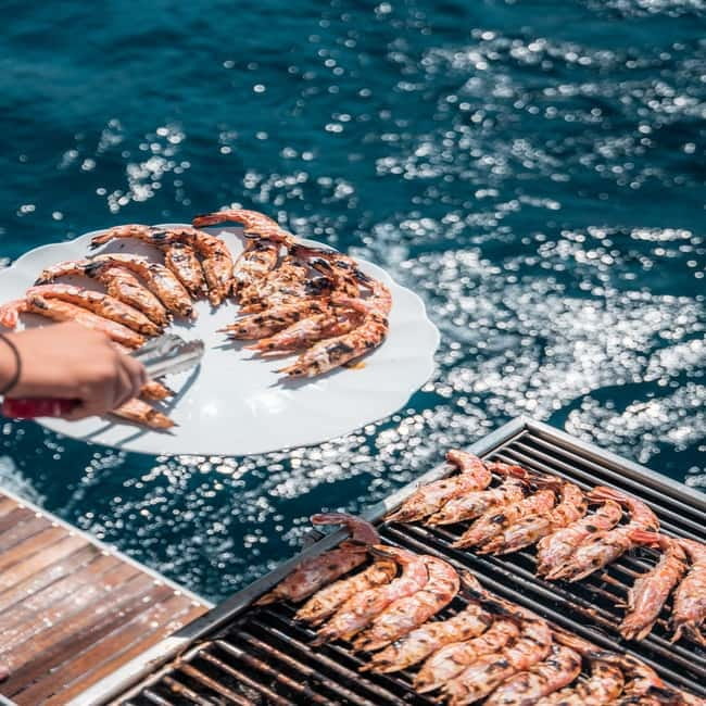 Santorini: Majestic Catamaran Cruise with Meal and Drinks - Greek food, BBQ, wine, and the open bar