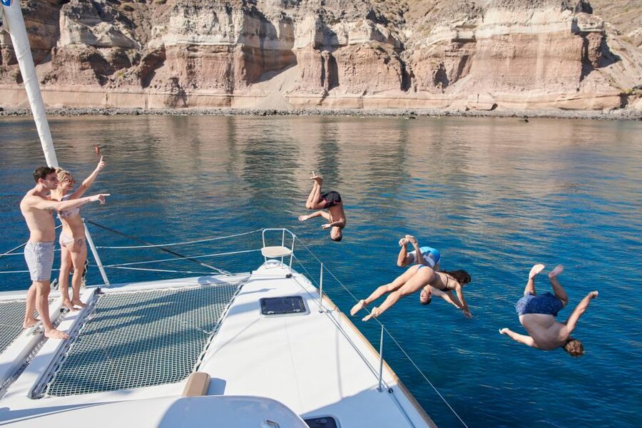 Santorini: Platinum Catamaran Cruise w/ BBQ Meal & Open Bar - Leaving Vlychada with room to relax