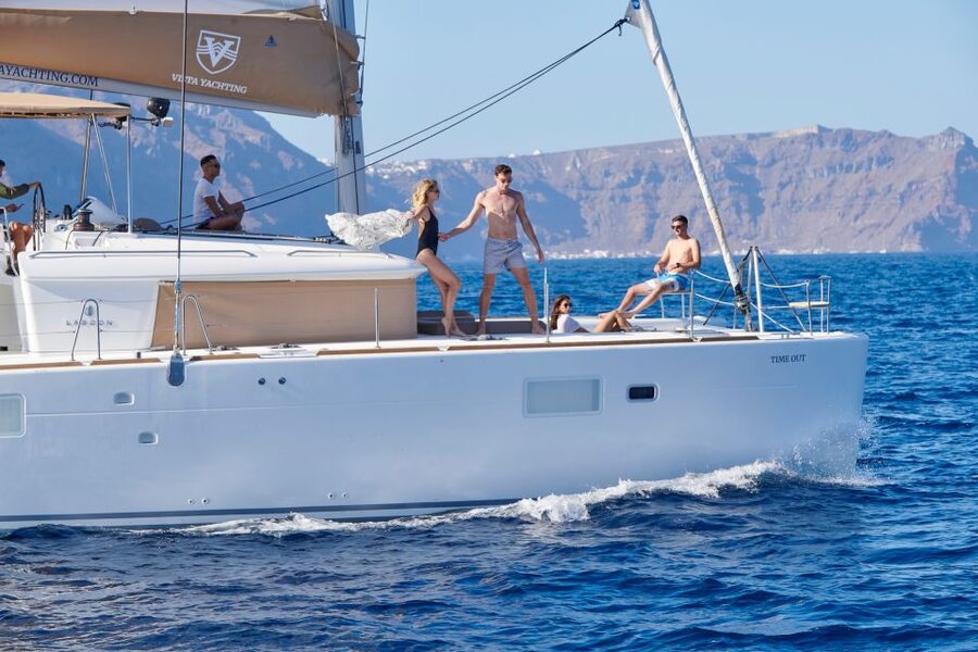 Santorini: Platinum Catamaran Cruise w/ BBQ Meal & Open Bar - Sunset near Akrotiri Lighthouse