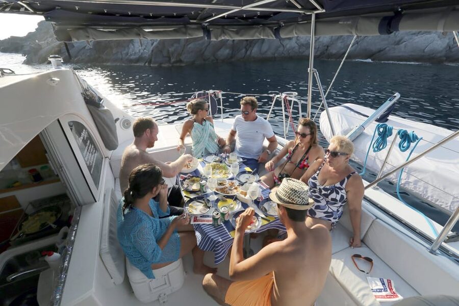 Santorini: Private Catamaran Cruise with Food & Drinks - Mésa Pigádia: the main swim, meal, and rest stop