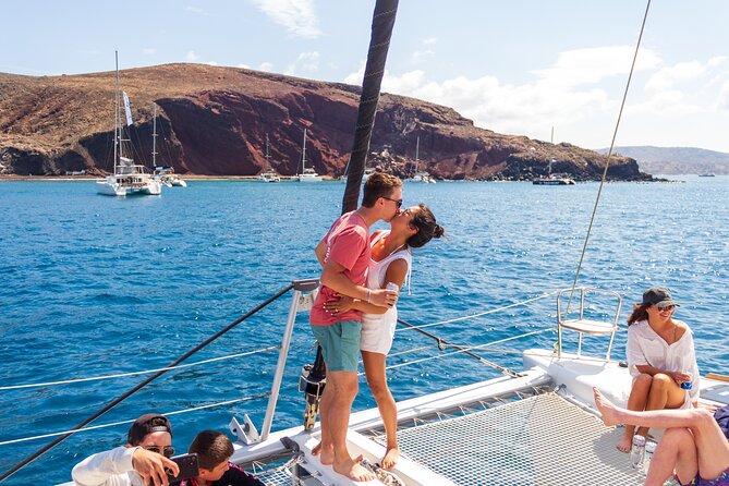 Santorini Sailing Catamaran Daily Cruises w/ Greek BBQ @Thirasia - Setting out from Vlychada Marine