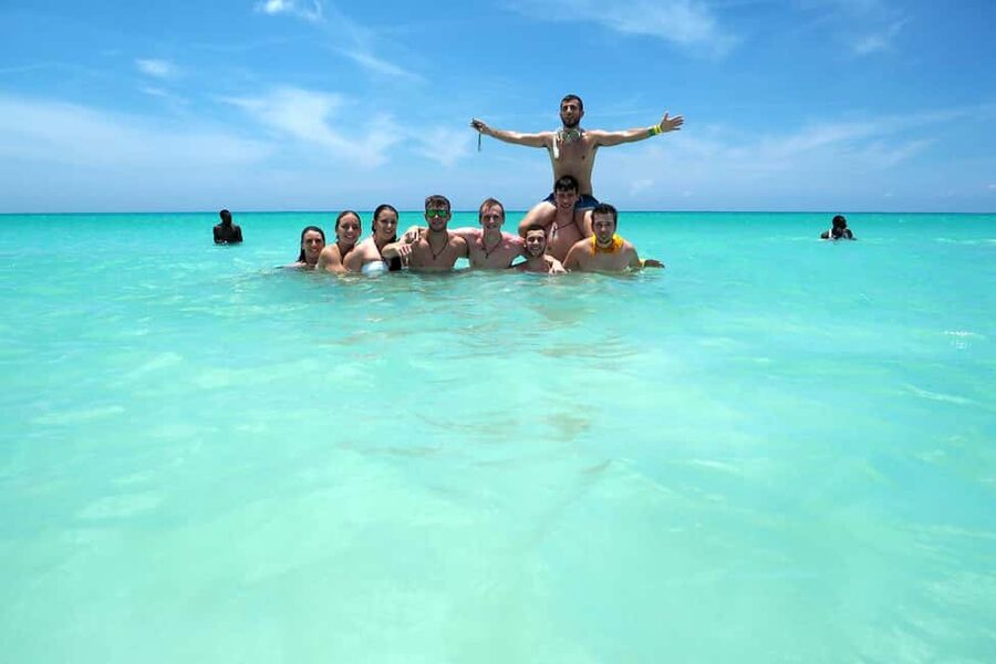 Saona island small group boat with water slide with lunch - Boarding the boat in Bayahibe