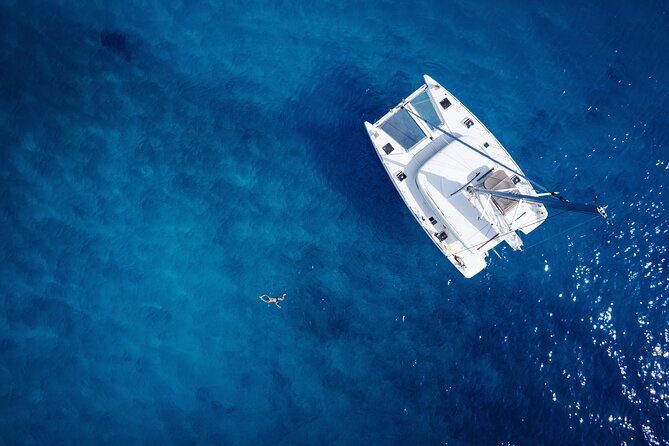 Semi Private Cruise with luxury Catamaran in Delos and Rhenia islands - Rhenia is the main swimming stop