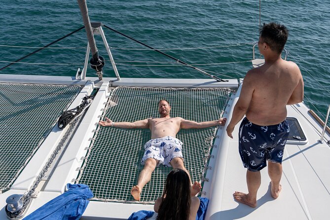 Semi Private Santorini Catamaran Tour - Red Beach, the island’s most dramatic shoreline