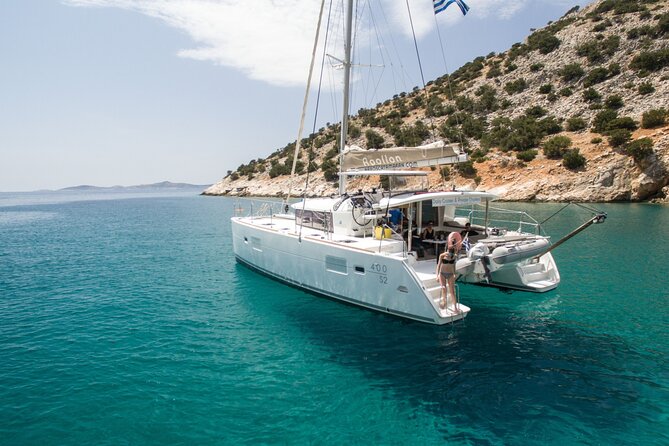 Shared Catamaran All inclusive-Day Cruise to Naxos or Paros - Swimming in bright water and quiet coves