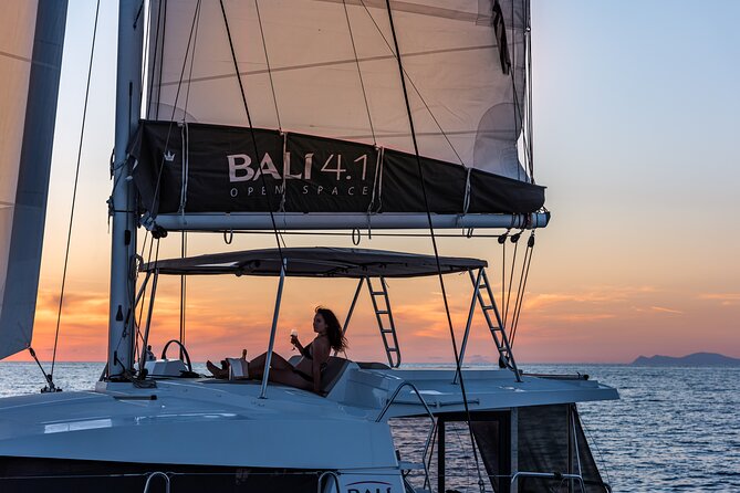 Shared Catamaran Half Day Cruise in Santorini - Swimming at the volcanic springs